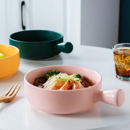 The ceramic serving bowls have a nice and clean design. The handle will make it easy to carry them to the table.  