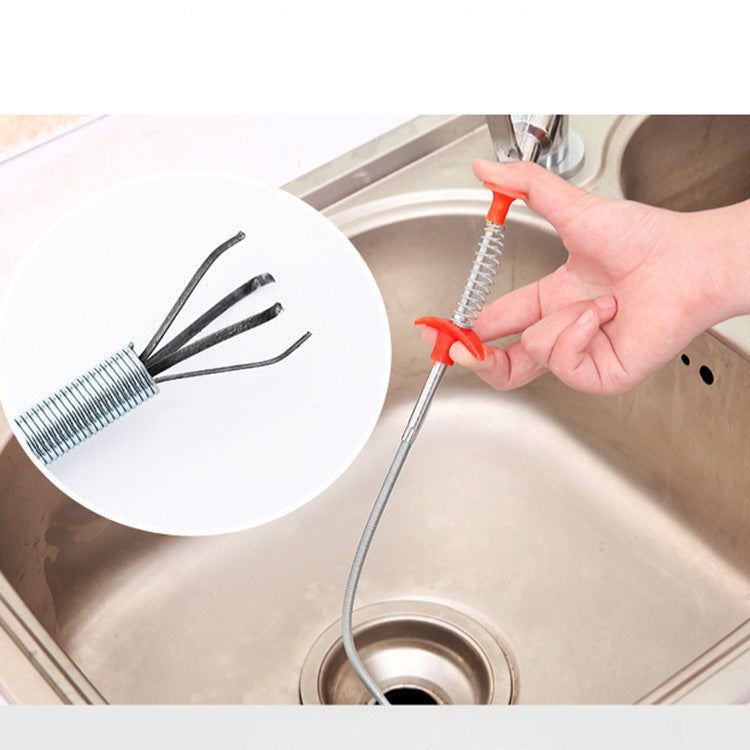 Insert the drain cleaner in the drain or pipe. Push the top handle to open the claws, find the object, hair or gunk and release the handle to grip. 