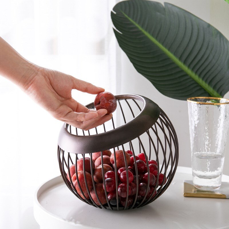 The stylish bowl is ideal to store grapes, nuts and other small fruit
