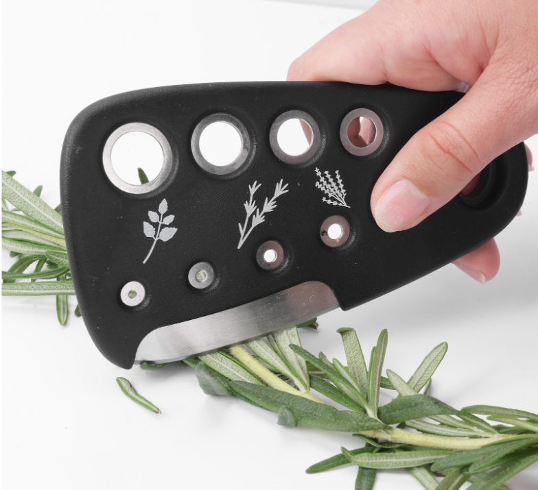 One of the widgets of the kitchen tool set is a herb stripper with different sizes 
