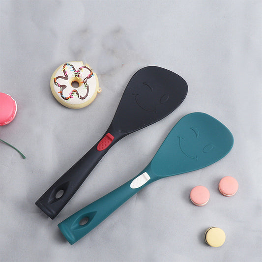 Silicone ladle, great for stirring your meals. Available in black and in green